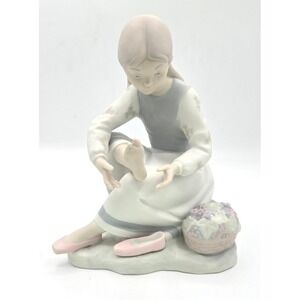 NAO by Lladró Spanish Porcelain Figurine – Seated Girl with Flower Basket 7"